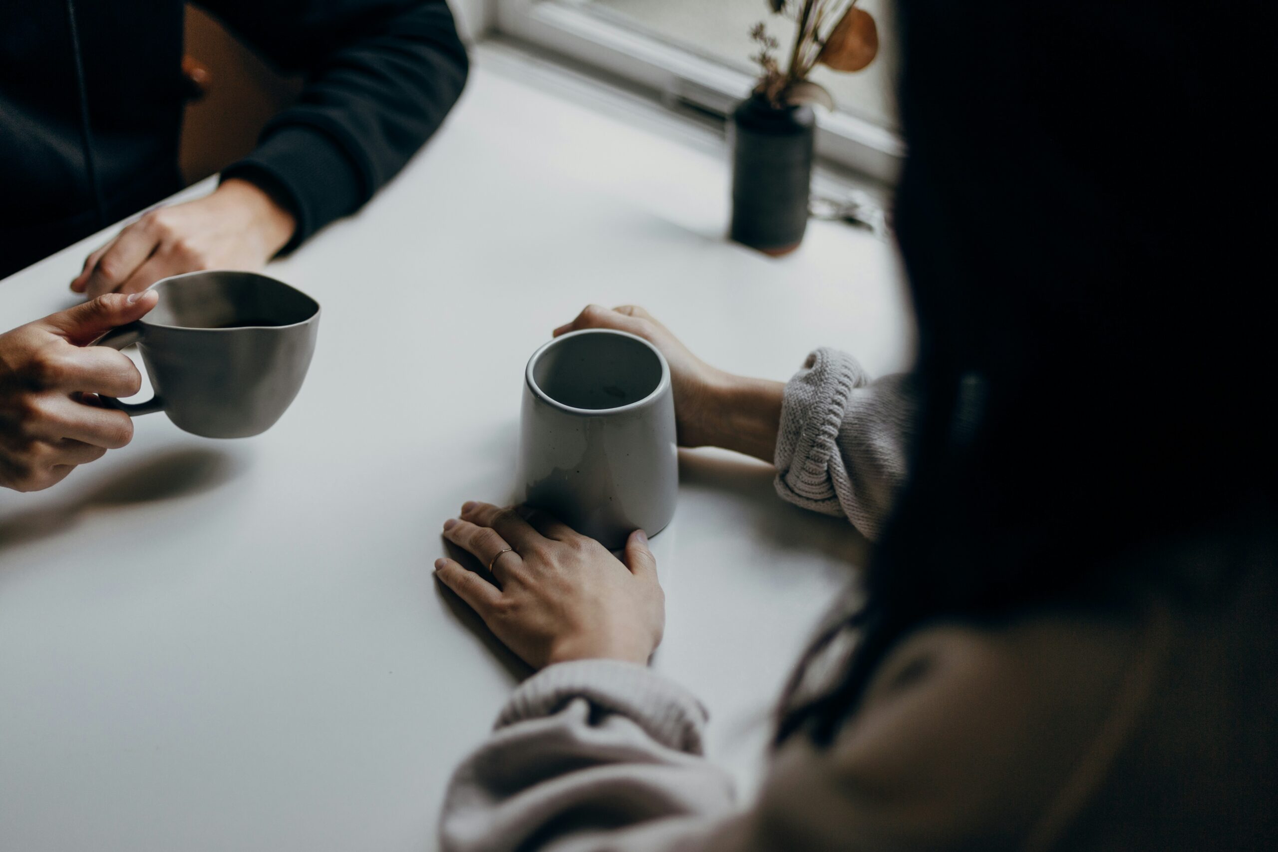 two people drinking coffee | centerforrisingminds.org